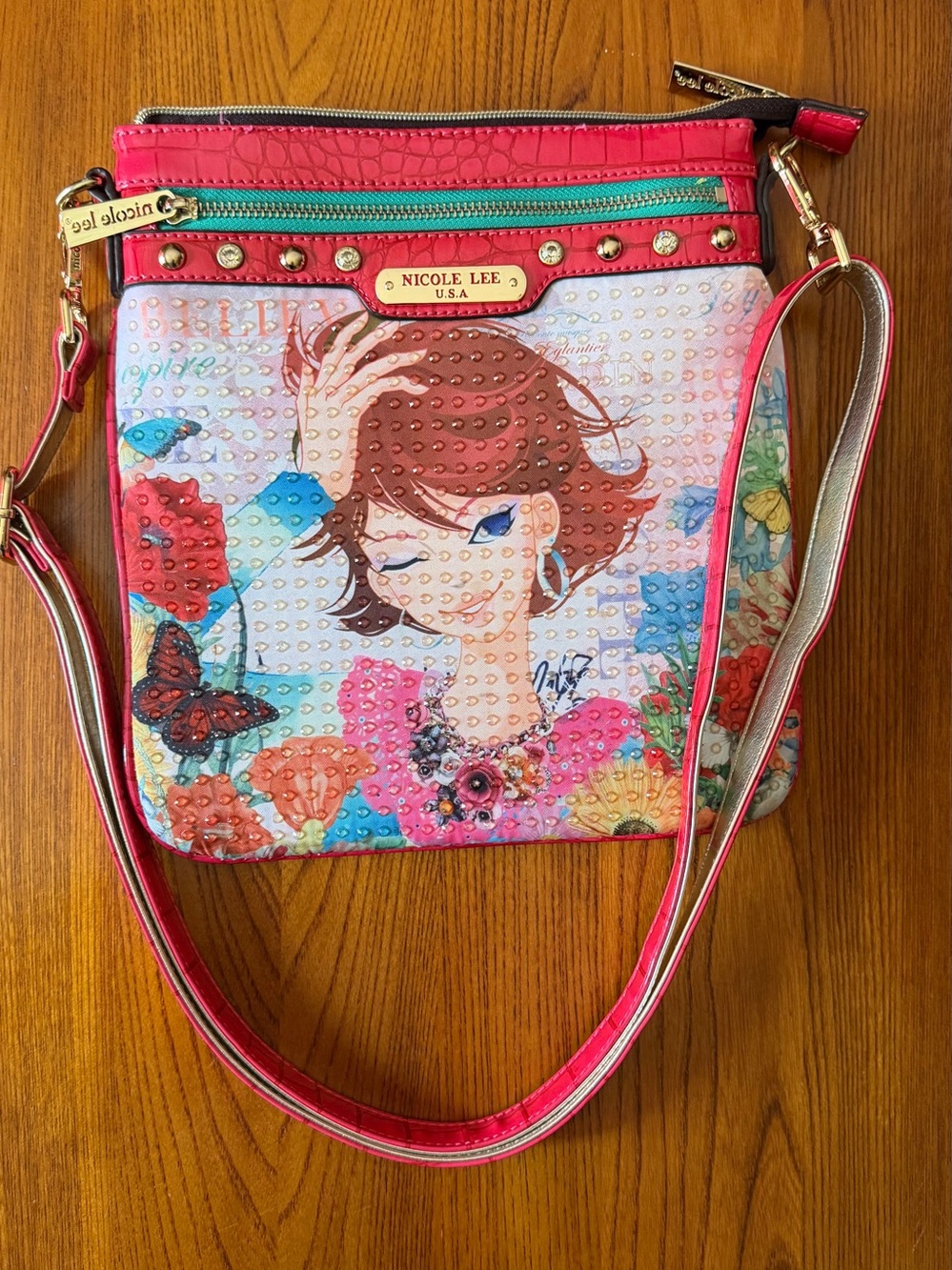 Nicole Lee Pink Graphic Crossbody Bag with Gold Accents